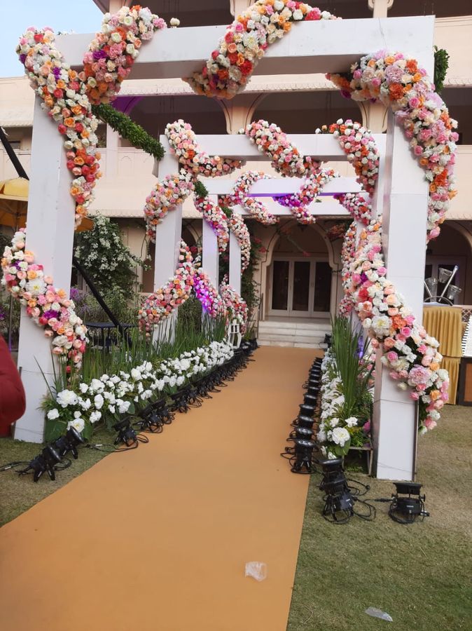 Floral arch walkway wedding entry