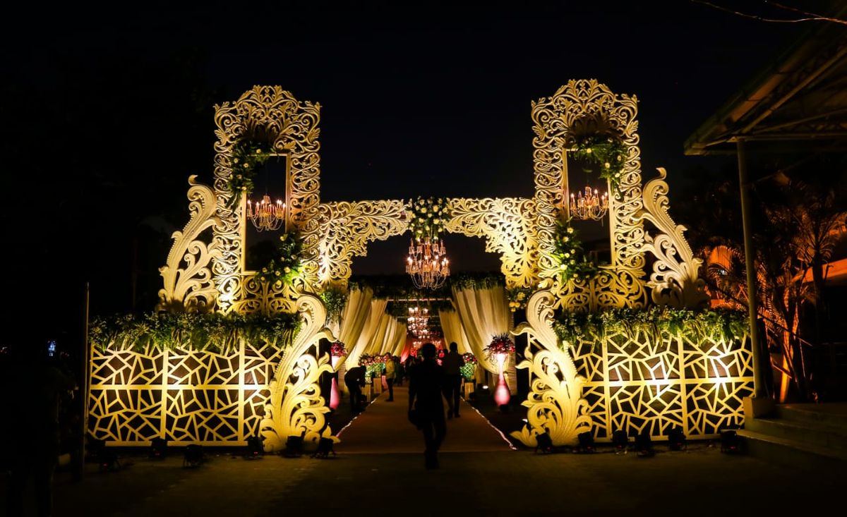 Purple lit entrance gate iron columns