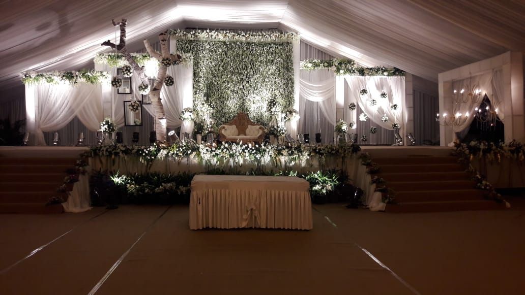 Colorful flower arch wedding