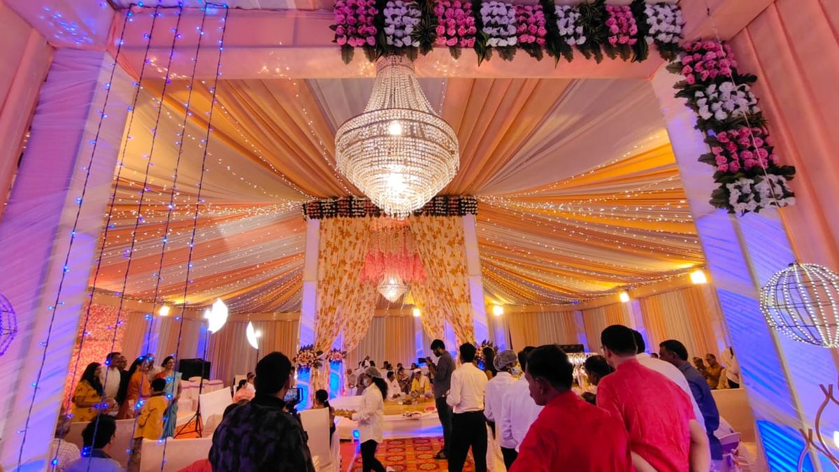 Indoor cross drape ceiling wedding