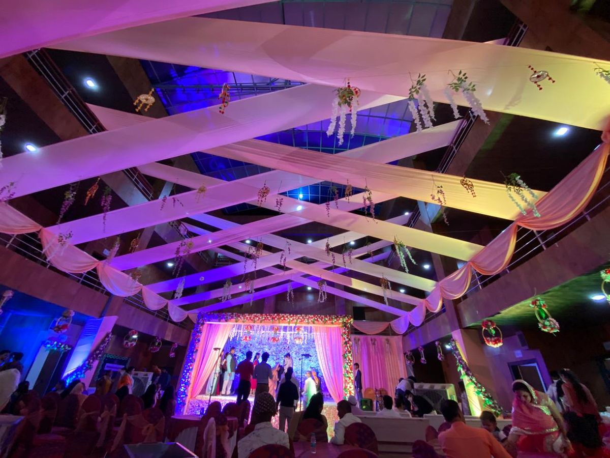 Gold white kapda mandap wedding