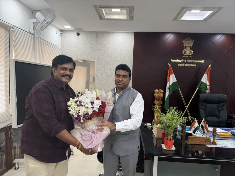 Vijay Shinde with District Collector CSN